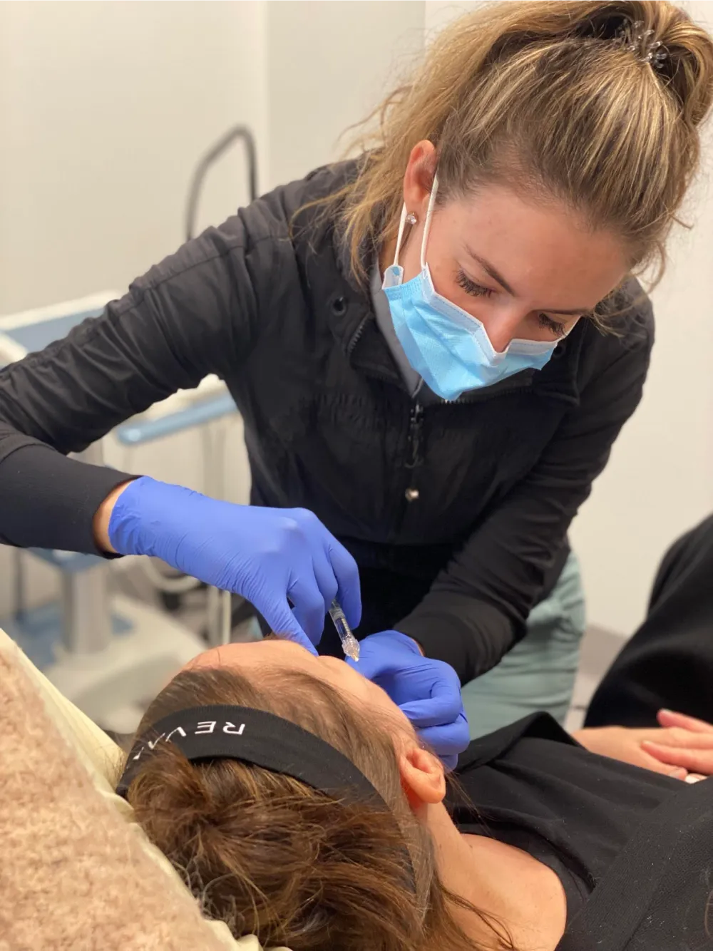 Photo of a patient receiving a cosmetic injection of dermal filler.